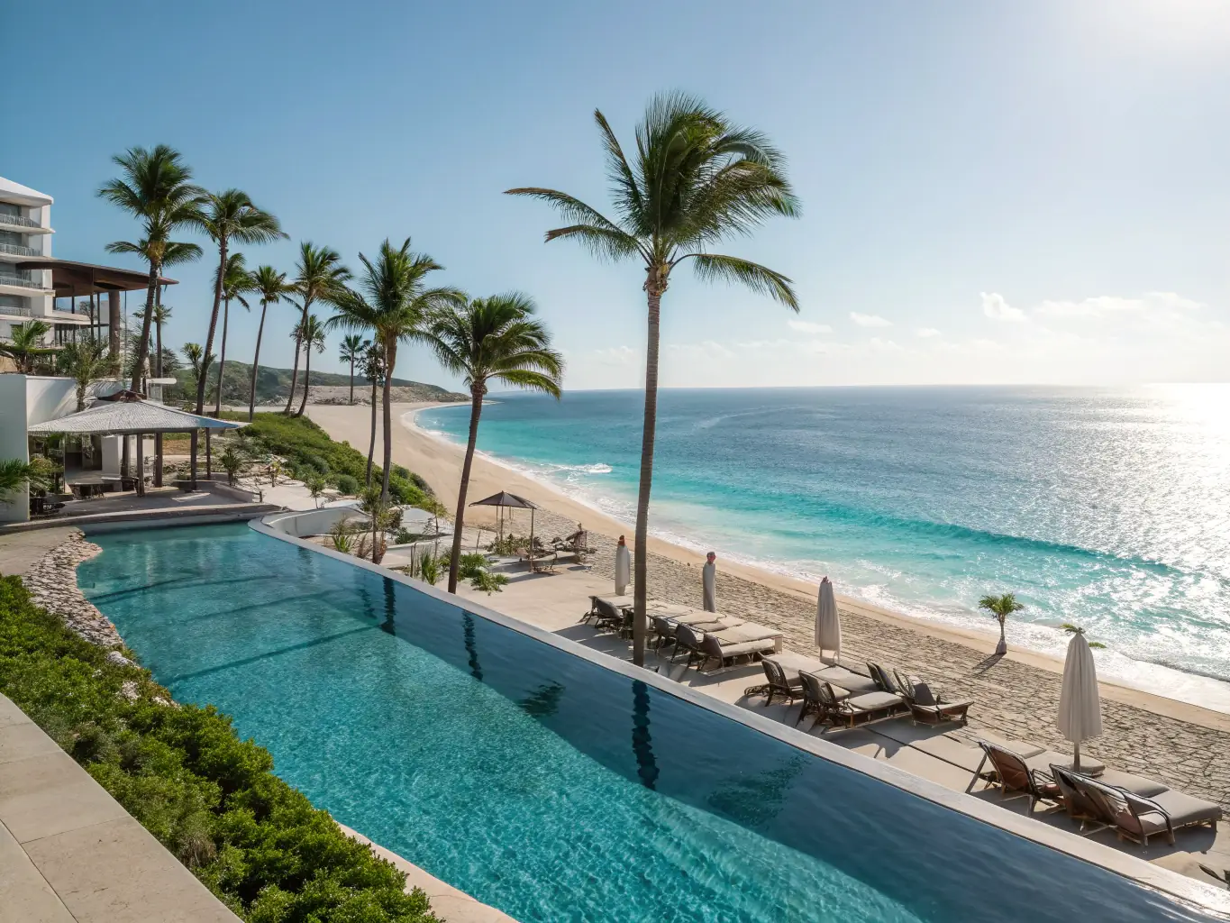 An elegant image of a luxurious resort with crystal-clear waters and pristine beaches, representing luxury travel and relaxation.